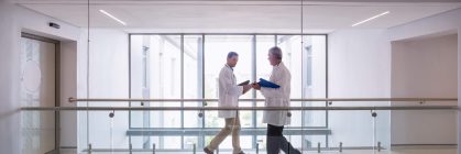 two-doctors-interacting-with-each-other-2021-08-28-17-23-21-utc-Custom.jpg
